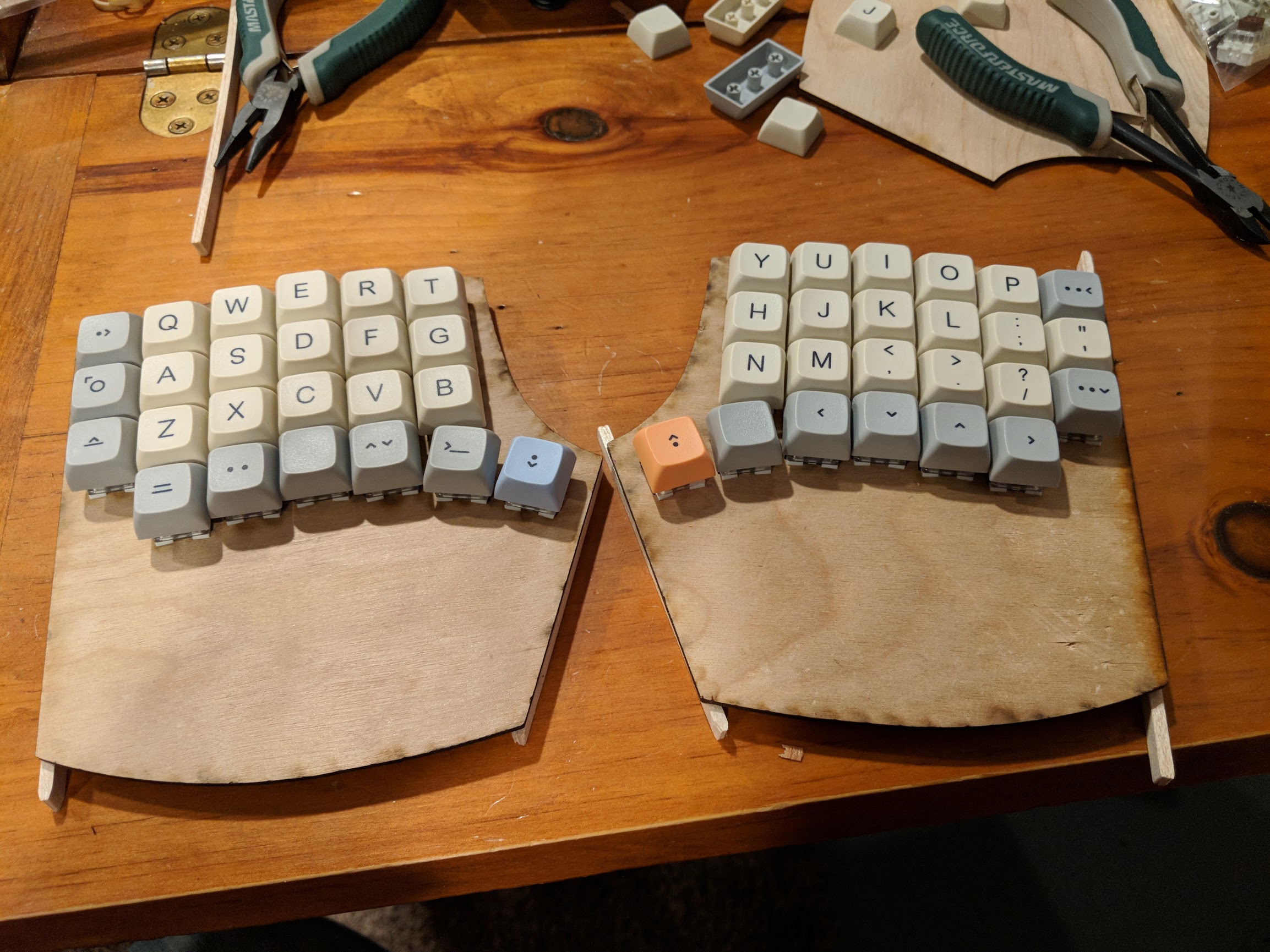 Wooden keyboard plates with keys so close together there are no gaps and you can't press the buttons